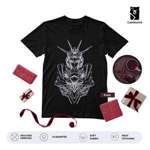 May include: Black t-shirt with a white line drawing of a robot's head and torso. The word "Front" is printed on the shirt. The image includes gift boxes and a cup of tea.