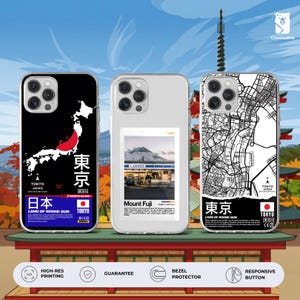 May include: Three phone cases with Japanese designs. One case shows a map of Japan with a red sun, the word "Tokyo" in Japanese, and "Land of Rising Sun." Another case displays a photo of Mount Fuji. The third case has a black and white map of Tokyo.