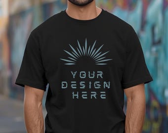 Op de afbeelding: Zwart t-shirt met een lichtblauw zonneschijnontwerp en de tekst "YOUR DESIGN HERE". Het t-shirt heeft een ronde hals en lijkt van zacht materiaal te zijn.