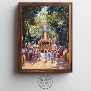 May include: A framed print of a colourful painting showing a lively outdoor celebration. The artwork features a procession of people, including children in bright dresses, gathered around a decorated structure. The painting is set in a verdant, green environment.