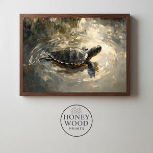 May include: A framed art print featuring a turtle swimming in water. The turtle has a dark shell and is surrounded by rippling water with light reflections. The frame is a dark brown color. The Honey Wood Prints logo is at the bottom.
