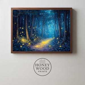 May include: A framed print of a forest scene with a path illuminated by golden light. The artwork features tall trees in shades of blue and green, with glowing orbs scattered throughout. The frame is a dark wood. The Honey Wood Prints logo is visible.
