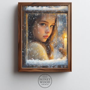 May include: A framed print featuring a young person looking out a window at a snowy scene. The person is holding a lit candle. The frame is a dark wood. The print has the Honey Wood Prints logo at the bottom.
