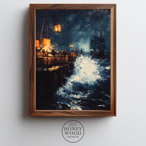 May include: A framed print of a stormy seascape. The artwork depicts a pier with lit lanterns, crashing waves, and a ship at sea under a dark, cloudy sky. The frame is a warm brown color, and the print has the text "HONEY WOOD PRINTS".