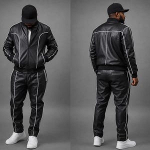 May include: Black leather tracksuit with white piping. The jacket has a zip closure and pockets. The pants have a drawstring waist. The outfit is completed with a black baseball cap and white sneakers. The tracksuit is shown from the front and back.