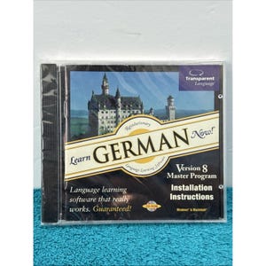 May include: A sealed CD-ROM case for Learn German Now! Version 8 Master Program by Transparent Language. The cover features a large castle, the text "Learn GERMAN Now!", "Version 8 Master Program", and "Installation Instructions" in white.