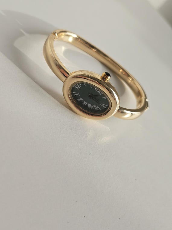 Vintage Gold Bangle Watch – Elegant Roman Numeral Bracelet Watch Vintage Oval Bangle Watch, by Tiffany & Co main image 4