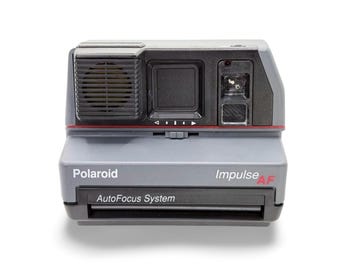 Cámara Polaroid Impulse AF vintage: sistema de autoenfoque gris, funda y película