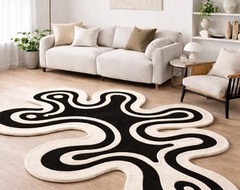 Abstract Wavy Black Ivory Hand-Tufted Modern Statement Area Rug for Contemporary Living Spaces