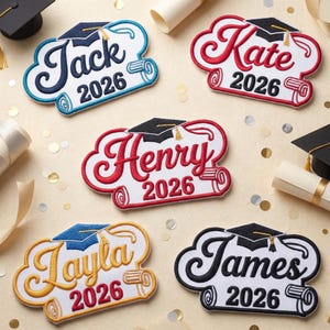 May include: Embroidered graduation patches with names like "Jack," "Kate," "Henry," "Jayla," and "James," each with "2026" below. The patches feature a graduation cap design and scroll details, in various colors like blue, red, gold, and black.