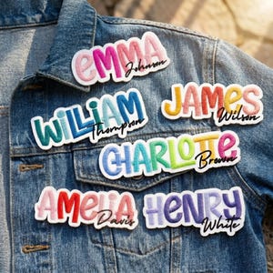 May include: Five custom name patches with embroidered lettering in various colours and fonts attached to a blue denim jacket. The patches display the names Emma Johnson, William Thompson, James Wilson, Charlotte Brown, Amelia Davis, and Henry White.