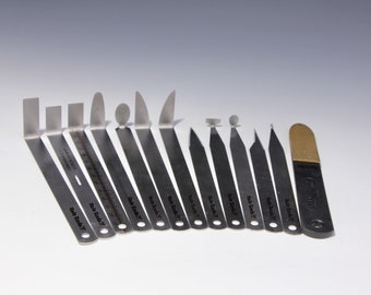 A Set of 12 plus a diamond file~The Stainless Steel Pottery Tools with Measuring Function (©copy right #TXu 1-961-453) by HsinChuen Lin