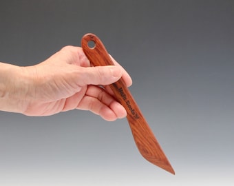 A #5 Mopane Wooden Knife (© Copy right #TXu 1-961-453) by Designed Master Potter Hsin-Chuen Lin 林新春