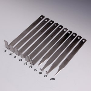 May include: Set of ten metal tools with different shaped tips, numbered 1 through 10. The tools are used for prying, scraping, and lifting.