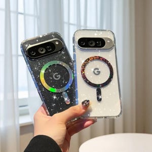 May include: Two phone cases with glitter and a magnetic ring design. One case is black with a rainbow ring, and the other is white with a multi-colored ring. Both cases have the Google "G" logo.