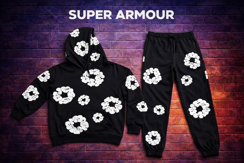 May include: A black hooded sweatshirt and matching sweatpants set featuring a repeating white circular graphic pattern. The text SUPER ARMOUR is printed in white at the top center of the image above the clothing items.