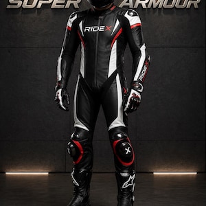 May include: Black and white motorcycle racing suit with red accents. The suit features the text "RIDE X" and "SUPER ARMOUR". The helmet is black with the "AGV" logo. The suit includes gloves, boots, and knee pads.