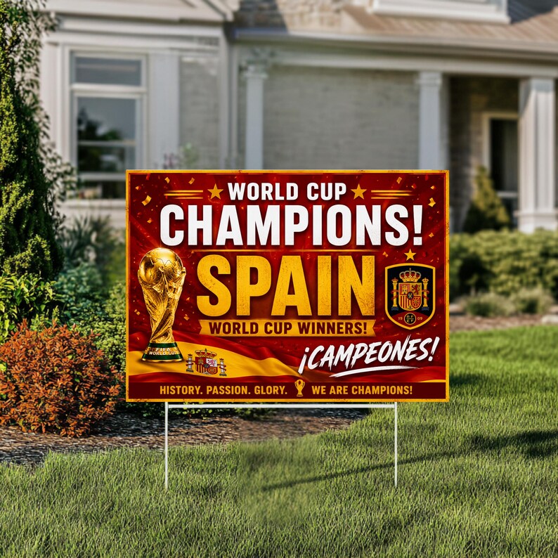 Close-up of a soccer championship lawn sign template with the Spanish flag, a golden World Cup trophy, and motivational text "History. Passion. Glory. We Are Champions!". Designed with a glossy finish on metal stakes.