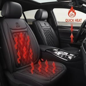 May include: Black car seat covers with a diamond-stitched pattern and a heating element. The image shows red arrows and the words "QUICK HEAT" to indicate the heated seat function. The car interior is visible in the background.