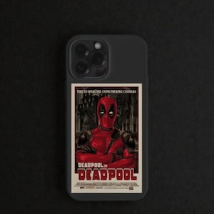 May include: Black phone case featuring a Deadpool movie poster design. The poster shows Deadpool in his red and black suit, with the text "Deadpool" and "Time to make the Chimi Fucking Changas."