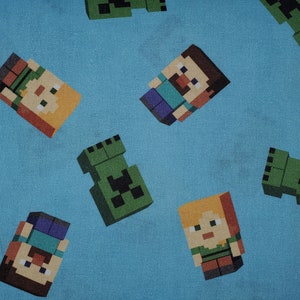 Mindcraft print blue  back ground From Springs Fabrics Licensed Print cotton quilt fabric characters, video game