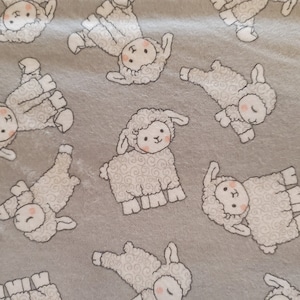 Cute lambs on light grey background by A E Nathen company flannel cotton sheep, lamb, baby blankets, pajamas