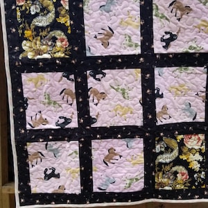 Sale  Beautiful handmade baby quilt pieced with Bambi characters and prints from Moda backed with a soft free spirit fabric