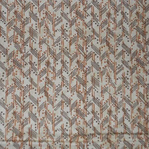 May include: A fabric featuring a repeating geometric pattern on a light beige background. The design consists of vertical columns of dark gray diagonal lines paired with thin orange vertical lines and small orange dots arranged in a chevron-like layout.
