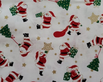 May include: White fabric with a repeating pattern of Santa Claus figures carrying presents and Christmas trees. The background is white with gold stars.