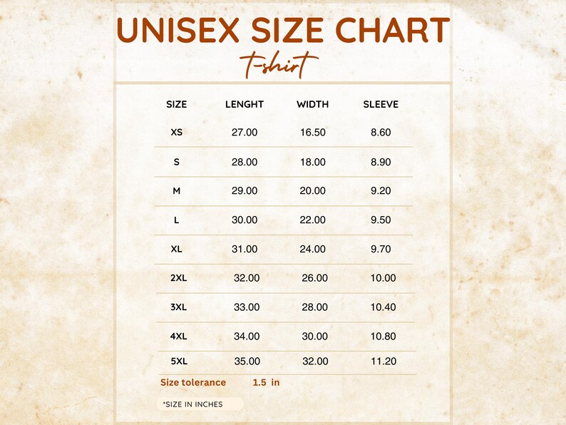 May include: A unisex t-shirt size chart with brown text on a light background. The table lists sizes from XS to 5XL with corresponding length, width, and sleeve measurements in inches. It includes a size tolerance note of 1.5 inches.