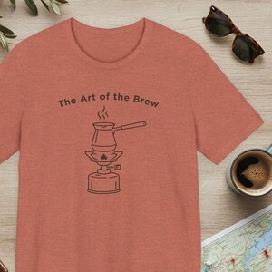 The Art of the Brew Camping Coffee Shirt, Coffee Lover Gift, Minimalist Barista Tee, Line Art Outdoor Graphic Apparel, Nature Lover Present Heather Clay