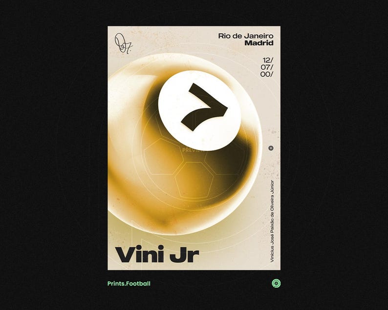 May include: A poster with a golden-yellow background and a large white circle with a black number seven. The poster includes the text "Rio de Janeiro Madrid" and "Vini Jr". The bottom of the poster reads "Prints.Football".