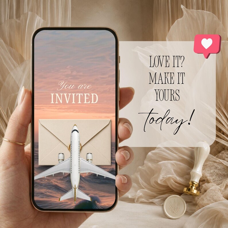 Coastal wedding Save the Date video displayed on a phone held in hand with the animated airplane and envelope opening scene.