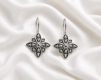 Pendientes colgantes de plata de ley 925 con flores en forma de estrella y marcasita, con circonitas.