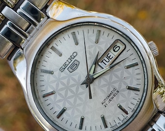 Reloj Seiko 5 7S26 automático vintage de 21 joyas / Esfera geométrica plateada / Día y fecha / Reloj de pulsera analógico mecánico unisex de acero inoxidable