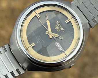 Reloj Seiko 5 automático vintage de 21 joyas, esfera negra con cristal geométrico, movimiento japonés, fecha y día, reloj retro de acero inoxidable para hombre.