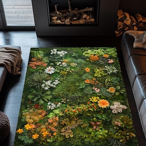 May include: A rectangular area rug featuring a vibrant, detailed floral design. The rug showcases a variety of plants, including daisies, and other flowers in shades of green, orange, yellow, and white. The rug is placed on a dark wood floor.