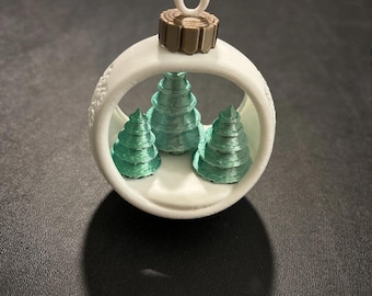 Adornos navideños de pino impresos en 3D