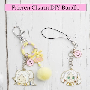 May include: Two anime-style charm DIY bundles. One charm features a yellow pom-pom, the letter "A", and the word "cute". The other charm has a pink circle with a "C" on it. The text "Frieren Charm DIY Bundle" and "Design you own charm" are also visible.