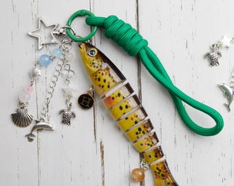 Kit de 5 llaveros con señuelos de pesca, correas para teléfono, llavero de varias secciones con señuelos de pesca, abalorios de océano, llavero de pesca y abalorio para bolsa de pesca.