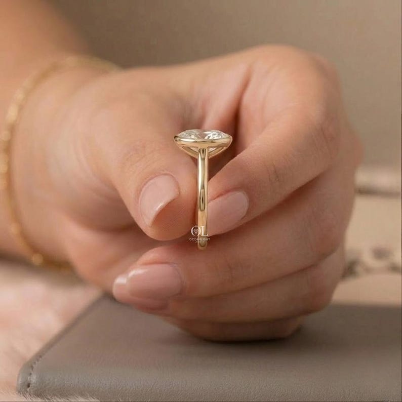 Elegant gold oval cut diamond engagement ring