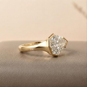 Pear shaped lab grown diamond solitaire engagement ring