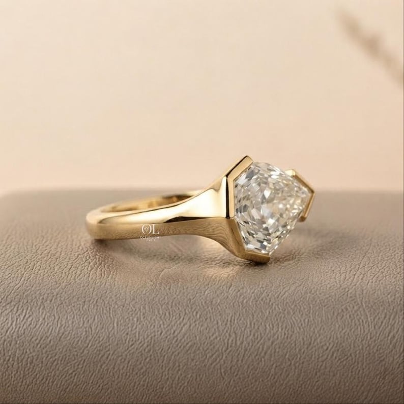 Pear shaped lab grown diamond solitaire engagement ring
