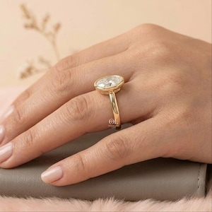 OceanlightJewels oval lab grown diamond bezel ring