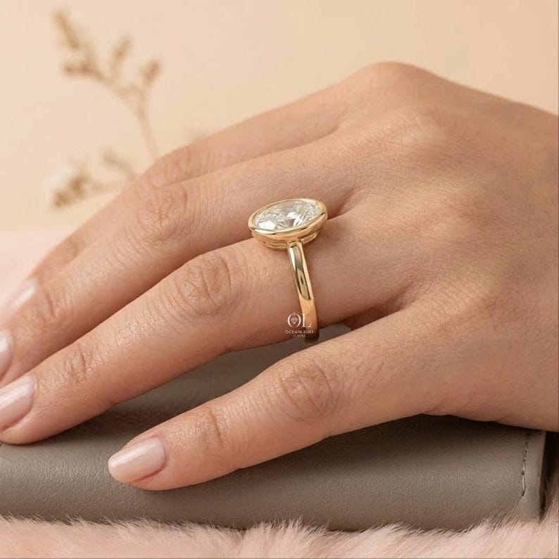 OceanlightJewels oval lab grown diamond bezel ring