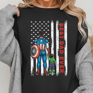 May include: Black t-shirt featuring a graphic of Captain America holding hands with the Hulk in front of a distressed American flag. The words "BEST DAD EVER" are printed vertically in red.
