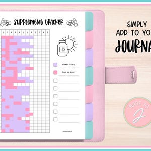 May include: A pink journal with a supplement tracker page. The tracker is a grid with the words "Supplement Tracker" at the top. The page has a vitamin D bottle and sun graphic. The journal also has the text "Simply Add to Your Journal".