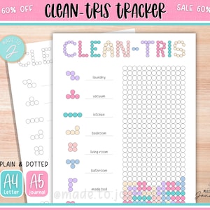 May include: A printable "CLEAN-TRIS TRACKER" journal page with a pink and teal border. The journal includes a cleaning checklist with sections for laundry, vacuuming, kitchen, bedroom, living room, bathroom, and making the bed. The journal is available in A4 and A5 sizes.