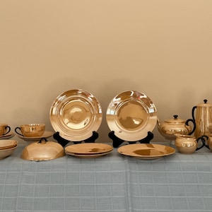 May include: A rustic wooden sign with the text "Welcome to our home" in white lettering. The sign features a distressed finish and a simple, inviting design, perfect for entryway decor.