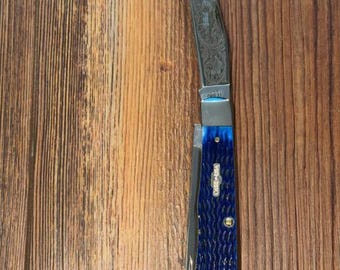 custom engraved case pocket knife , roping cowboy